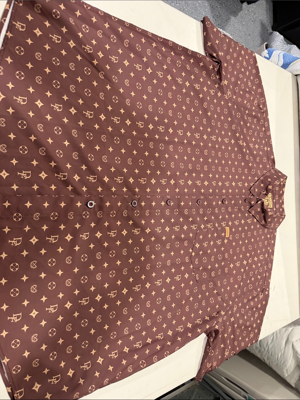 DIXXON Men's Brown Short-Sleeve Button-Up Shirt with Tan Monogram Pattern